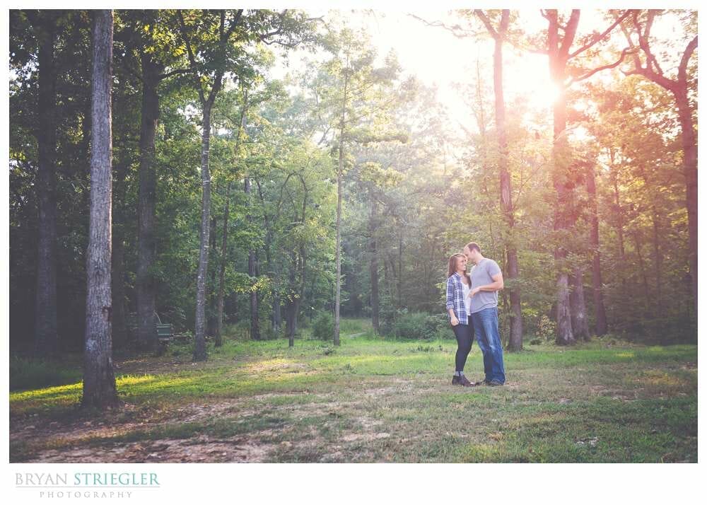 Arkansas Engagement Photos kissing in field