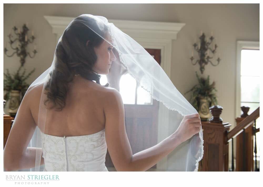 Staircase Bridal Portraits holding veil