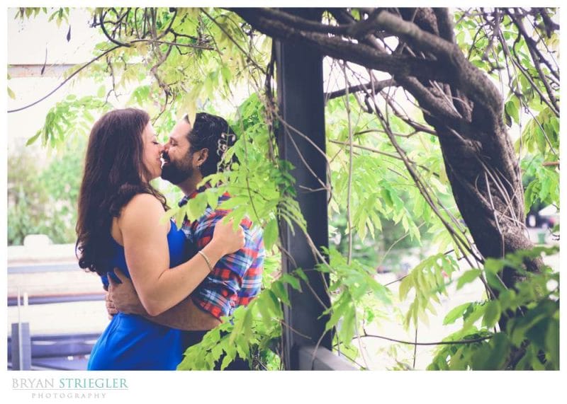 Arkansas Crossfit Engagement Photos kissing in trees