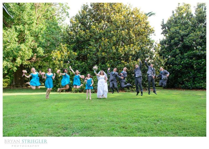 Bridal Party Jumping at Magnolia Gardens