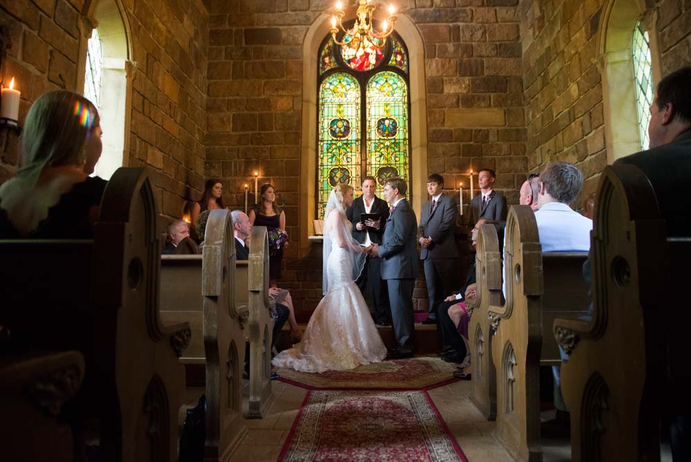 Ceremony inside the stone chapel at St. Catherine's at Bell Gable