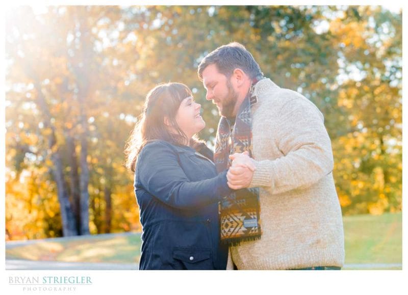 Engagement photo with bright fall leaves