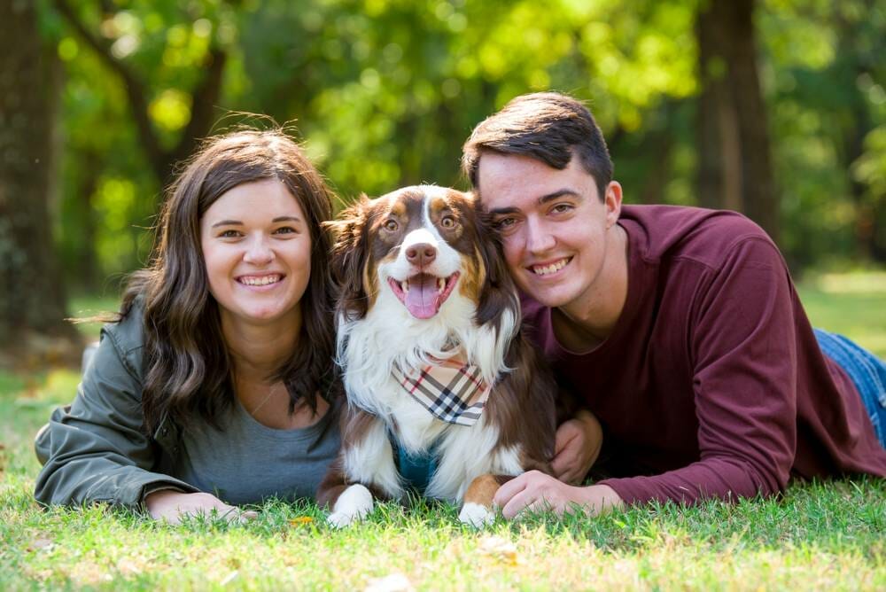 engagement photo with couple and dog