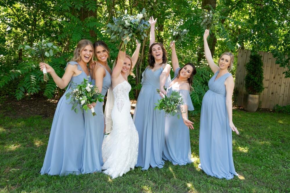 bridesmaids celebrating with bride at Matt Lane Farm