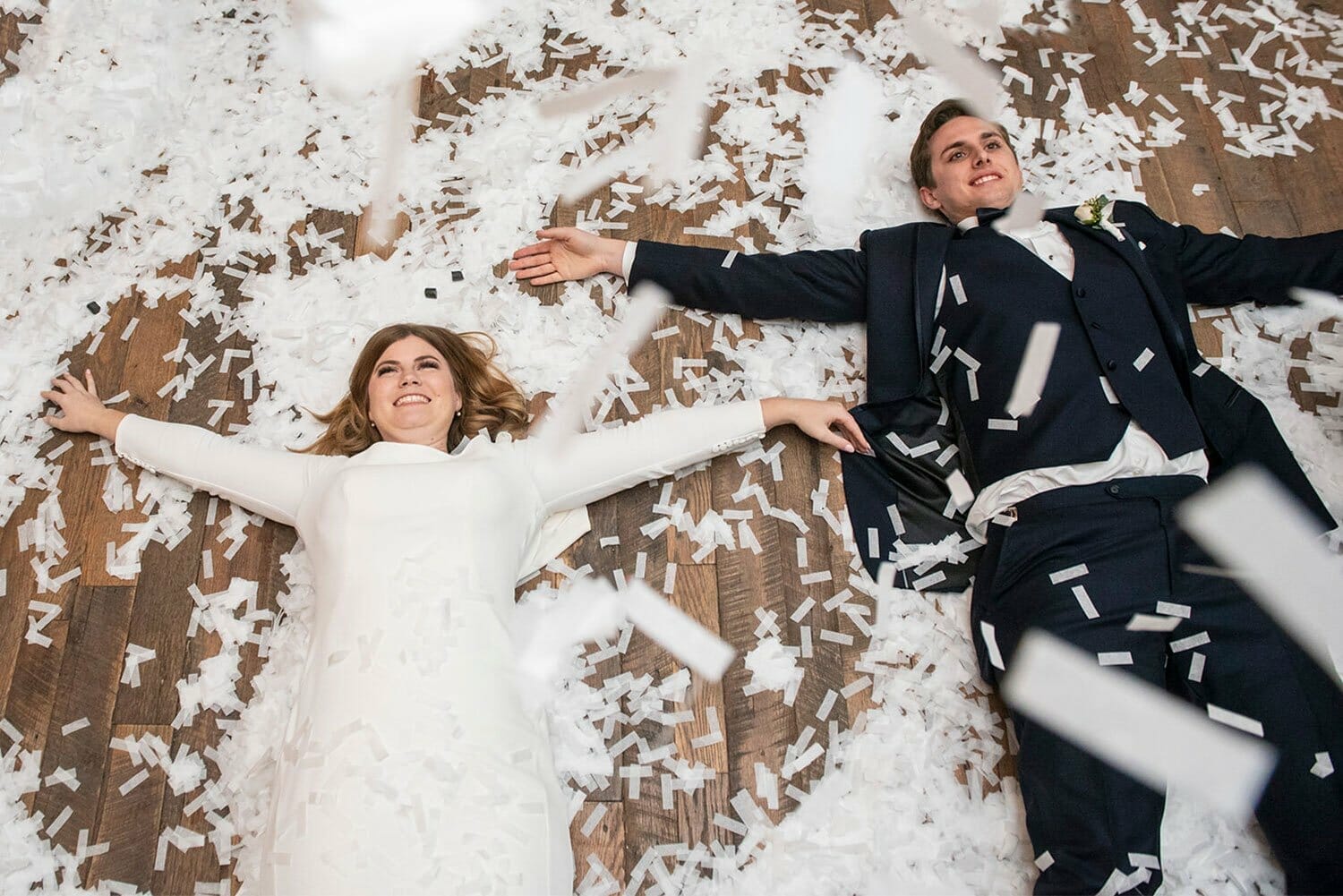 couple making snow angels