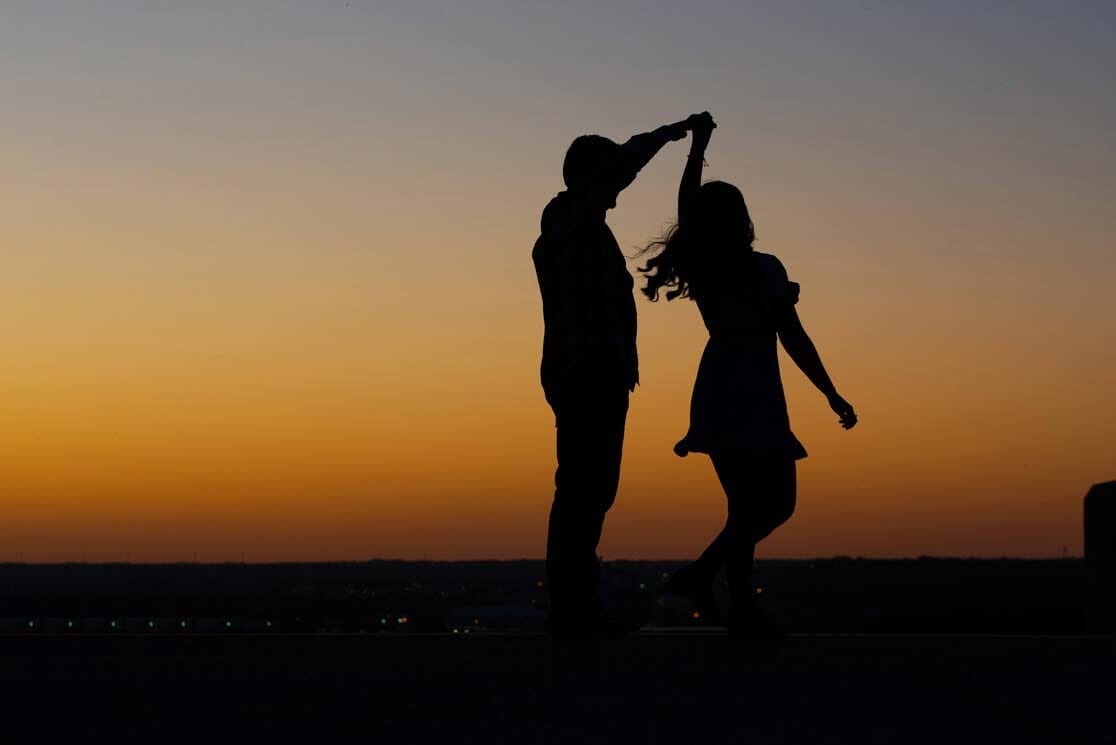 silhouette engagement photo near WWI museum in Kansas City