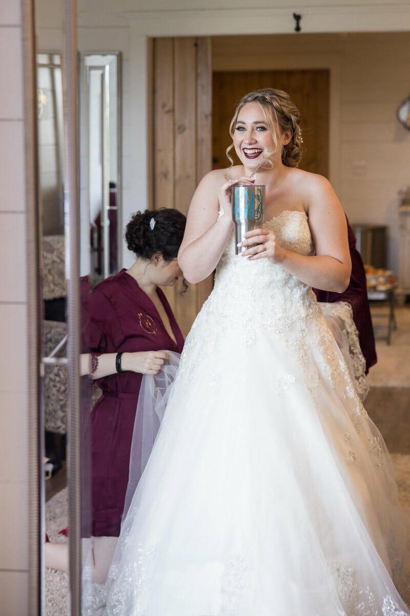 bride in front of mirror