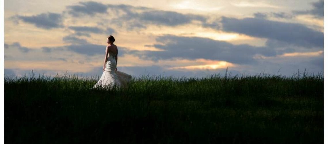 Sunset photo of bride at Cane Hill College