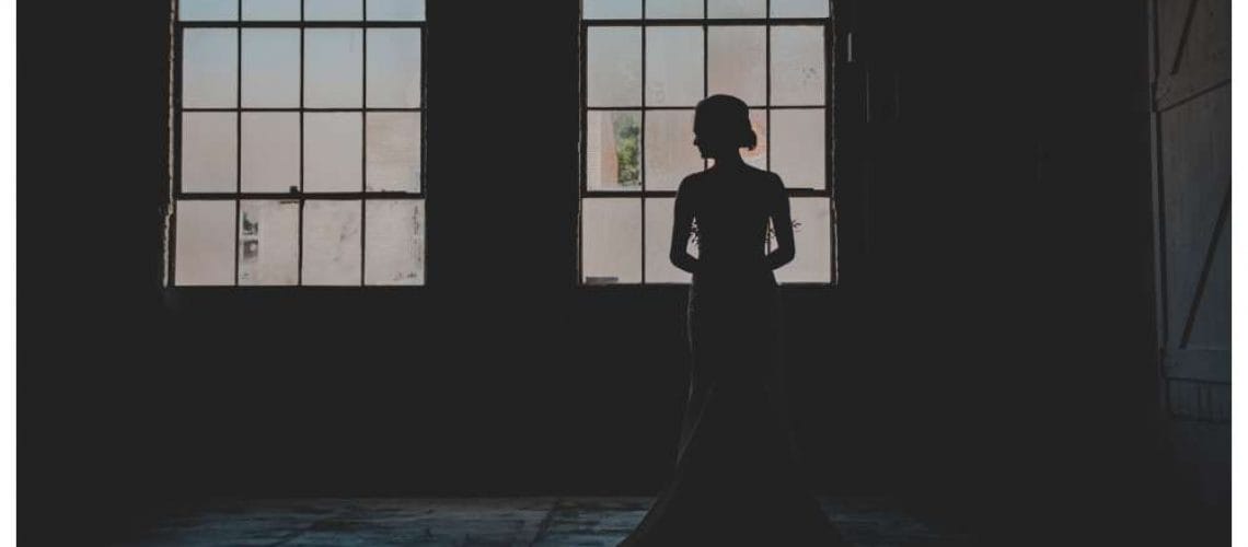 bridal portrait silhouette in front of windows